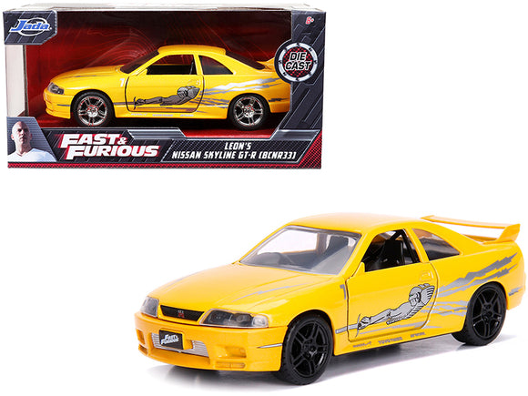 PACK OF 2 - Leon's Nissan Skyline GT-R (BCNR33) Yellow Metallic with Graphics Fast & Furious