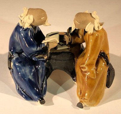 Ceramic Figurine<br>Two Men Sitting On A Bench Scribing - 2.5