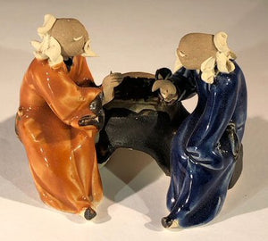 Ceramic Figurine<br>Two Men Sitting On A Bench Playing Chess - 3"<br>Color: Green & Red