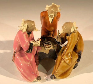 Miniature Ceramic Figurine<br>Three Men Sitting at a Table Scribing - 3"