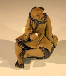 Ceramic Figurine -Mud Man Sitting with Cup - 2.5"<br>