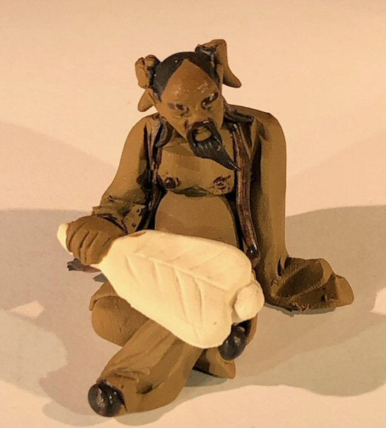 Ceramic Figurine<br> Mud Man Holding a Fan Sitting Down - 2