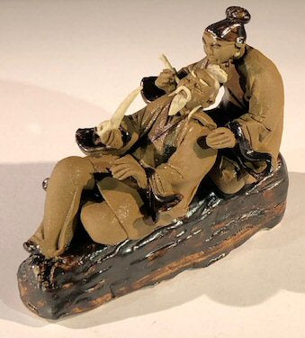 Miniature Ceramic Figurine<br>Mud Man & Women on Log Smoking a Pipe - 2.5