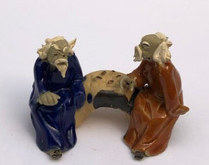 Ceramic Figurine<br>Two Men Sitting On A Bench - 2"<br>Playing Chess<br>Color: Blue & Orange