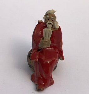 Miniature Ceramic Figurine<br>Man Holding Pan Flute - 2"