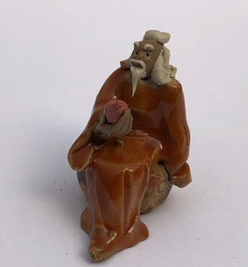 Miniature Ceramic Figurine<br>Man Holding Fruit - 2"